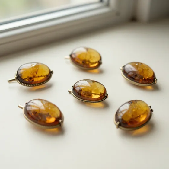Antique butterscotch amber brooches