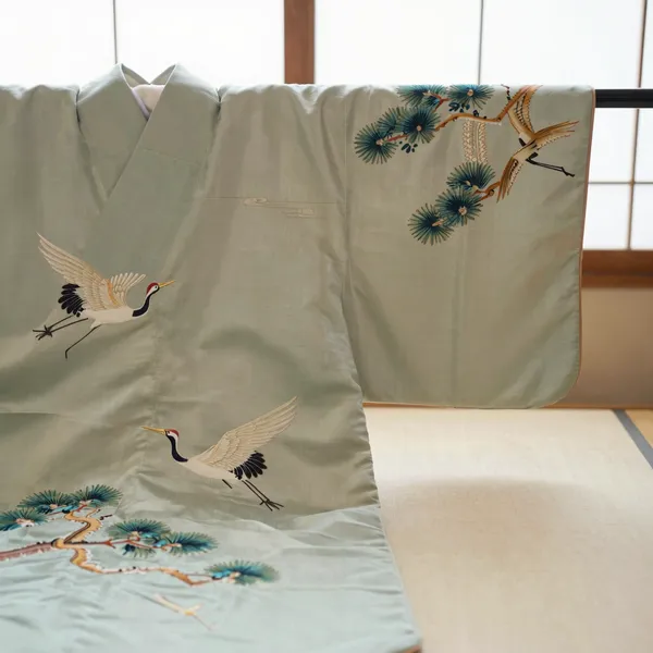 Illustrative: Meiji-period embroidered silk furisode with crane and pine motifs