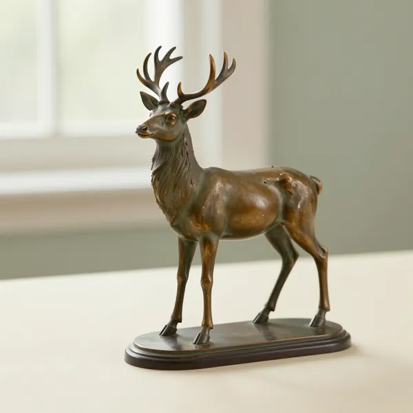 Illustrative: a signed 19th-century French animalier bronze of a stag, warm brown patina